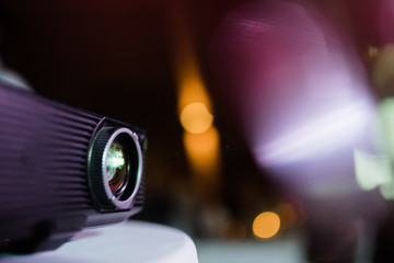 photo of a projector screening a short movie