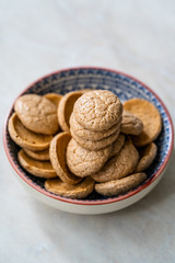 Fototapeta na wymiar Chewy Soft Italian Amaretti Cookie Biscuits in Ceramic Bowl.
