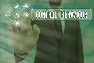 Conceptual hand writing showing Control Behaviour. Concept meaning Exercise of influence and...