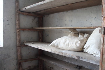 Fototapeta na wymiar wooden shelves with white bags