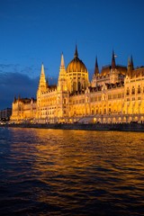 Fototapeta na wymiar Hungarian Parliament Building (Országház) on the Danube at sunset