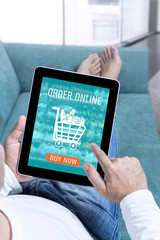 Businessman working from home on tablet and making shopping online order food form mobile on touch screen application. Business delivery service ready meal food and technology concept.