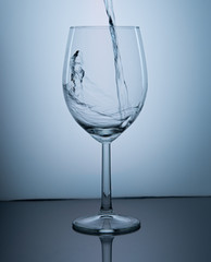 close up glass of water with splash