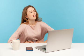 Periods cramps, stomachache at workplace. Woman employee holding painful belly feeling discomfort,...