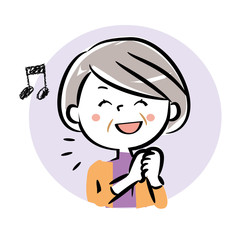 喜ぶ　笑顔　シニア女性