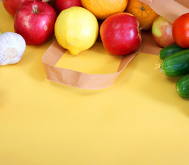 Different health food on yellow background. Flat lay. Grocery shopping and food delivery concept with copyspace