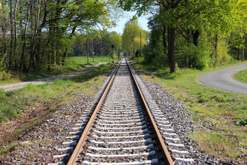 Fototapeta na wymiar rails and track bed in spring