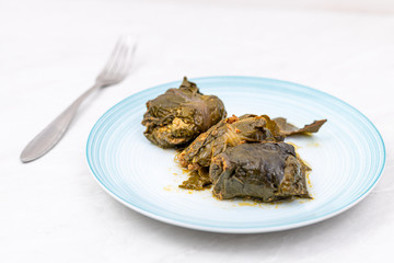 Minced meat rolls in Chard served on the plate. Traditional balkan meal made with chard and minced meat.