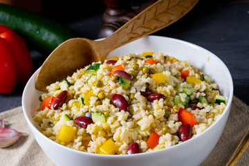 bulgur kaszotto with fresh vegetables and kidney bean
