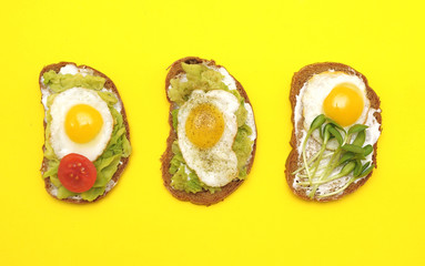 Healthy sandwiches with eggs, avocado.