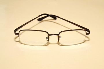Comfortable stylish glasses to improve vision on a white background close-up