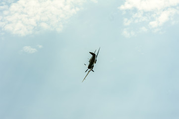 Fototapeta na wymiar spitfire aeroplane flying in the sky