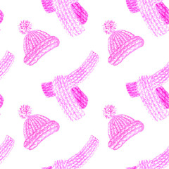 Seamless pattern with knitted hat and scarf. Pink knitted clothing for winter