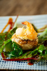 Gourmet appetizer shrimp stuffed mushroom cap