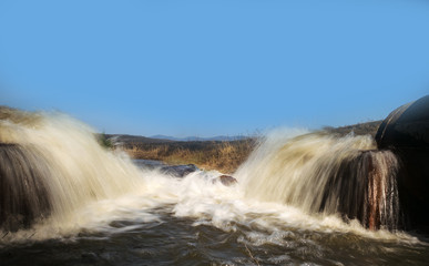 Discharge of waste water into the river. Violation of environmental ecology.