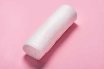 Tape medical bandage roll on color background, medicine equipment for first aid