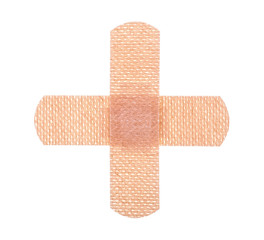 Medical equipment - strips of adhesive bandages plasters. Bandages in shape of a medical plus sign.