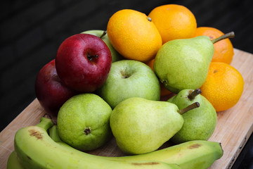 Fototapeta na wymiar Apples, oranges and pears