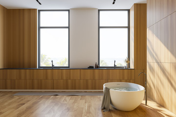 Luxury wooden bathroom interior with tub and sink