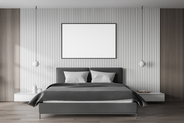 White master bedroom with poster