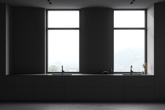 Double sink in grey bathroom with windows