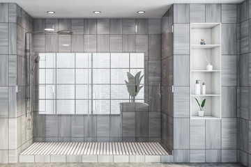 Gray wooden bathroom interior with shower stall