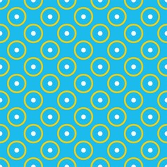 Tile vector pattern with white and yellow polka dots on pastel blue background