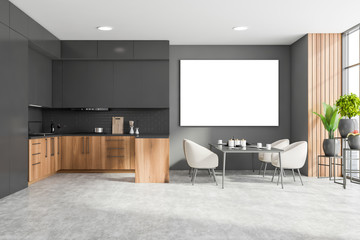 Wooden and grey kitchen with table and poster