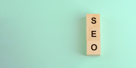 text seo on vertical row of wooden blocks search engine optimization business media concept mock-up