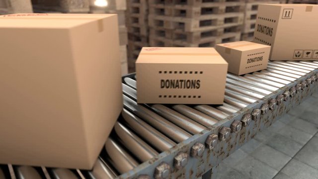 Production line with different size cardboard parcels. This factory produces cardboard and makes cube boxes from it. Labels on boxes can be with names of logistic companies and parcel assignments.