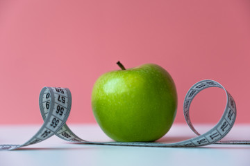 Apple on a pink background
