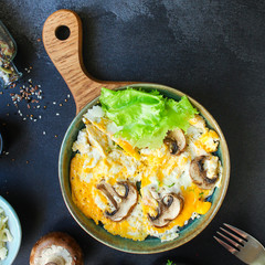scramble fried eggs
omelet with mushrooms
Menu concept healthy eating. food background top view copy space for text
keto or paleo organic product diet