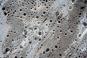 Drops of rain on the window. Shallow DOF background. Rain bubble background.