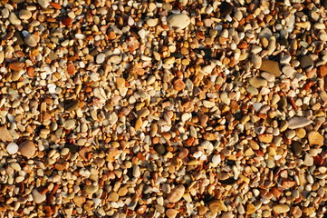 small sea stones on the shore
