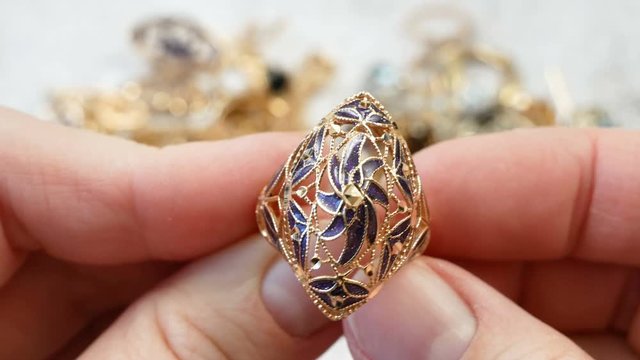 jeweler looking at beautiful ring, jewerly inspect and verify, pawnshop concept, jewerly shop concept