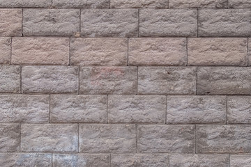 abstract background of stone lined wall close up