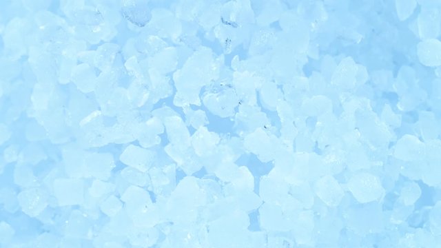 Super slow motion of exploding crushed ice, top view shot. Filmed on high speed cinema camera, 1000fps.