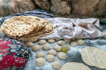 Preparation of organic tandoor bread and layered bread, one of the local flavors of Antioch