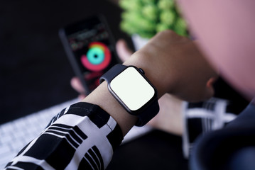 Bali Indonesia June 1, 2020 : Apple Watch Series isolated with white screen on woman's hand. Woman...
