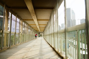walk way with a person running in Hong Kong