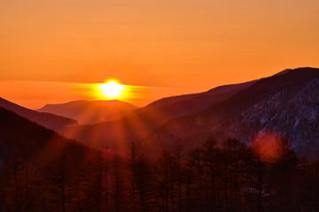 Sunset among the mountains on the road Lidoga-Vanino Khabarovsk territory.
