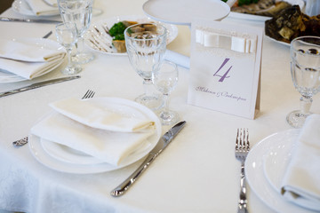 plates and dishes stand on the table for food