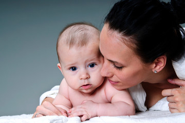 Mother holding sweet baby boy