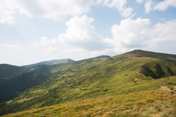 Beautiful landscape of green mountains. Travel outdoors.