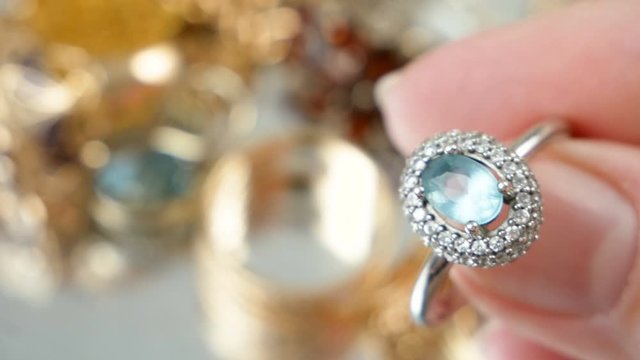 jeweler looking at beautiful ring, jewerly inspect and verify, pawnshop concept, jewerly shop concept