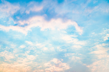 Obraz premium Beautiful sky with cloud before sunset. Colorful sky in twilight background. Bright Blue, Orange And Yellow Colors Sunset.