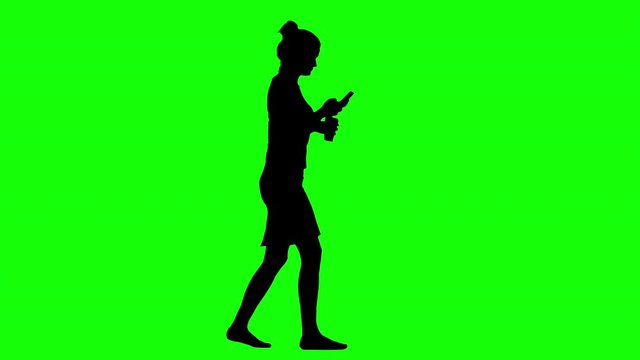 Businesswoman Using a Smartphone Drinking Coffee Walking Greeen Screen