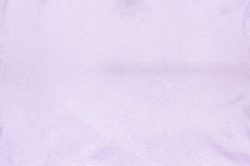 Fototapeta premium Abstract lilac fabric texture background. Creases of lavender color cotton.