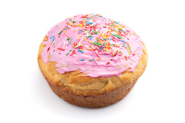 Homemade glazed and decorated pink easter pie isolated on a white background. Side view.