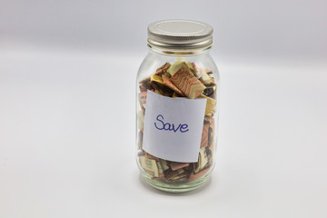 saving money in the glass with background
